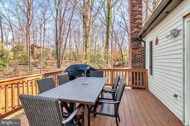 wooden terrace with grilling area