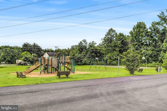 view of jungle gym featuring a yard