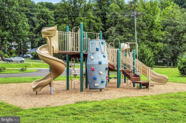 view of jungle gym featuring a yard