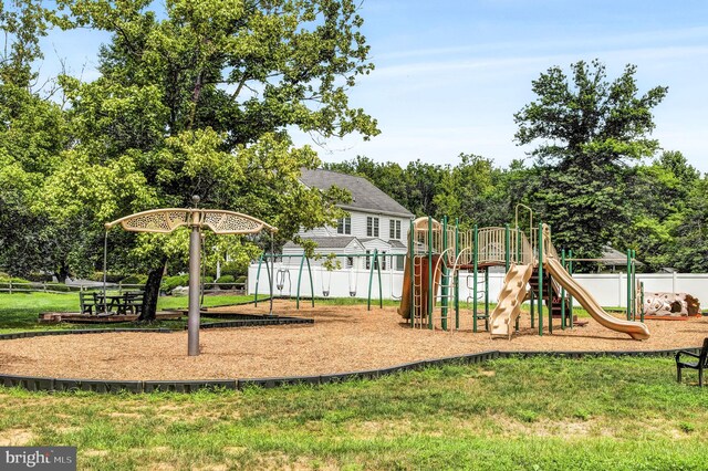 view of jungle gym featuring a yard