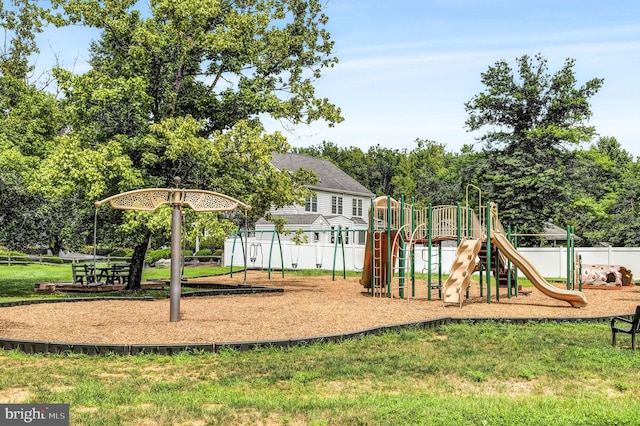 view of play area featuring a lawn