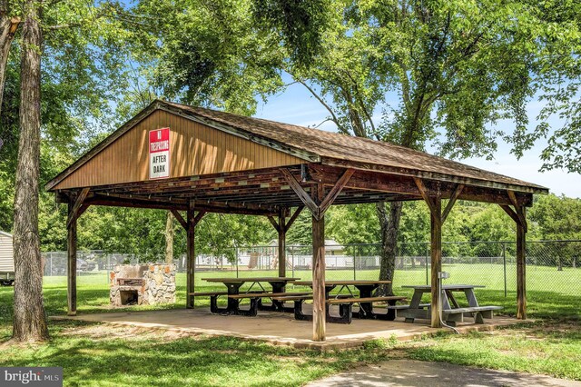 view of home's community with a gazebo and a yard