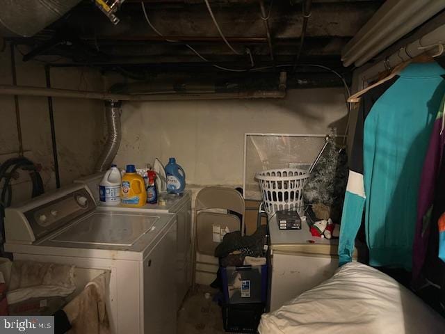 laundry area featuring separate washer and dryer