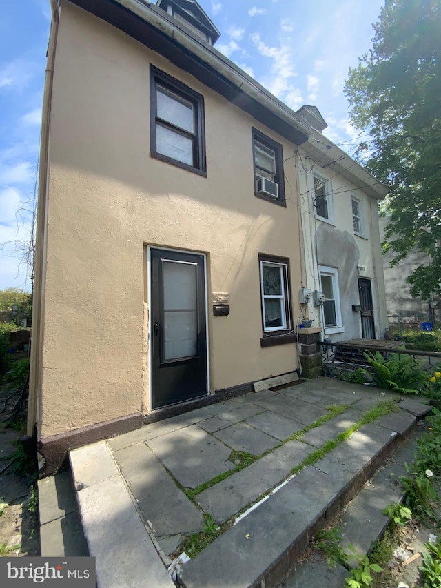 view of front of home with a patio