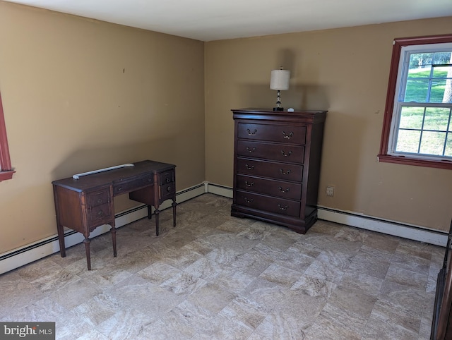 interior space featuring a baseboard heating unit