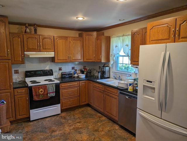 kitchen with dark tile floors, sink, white appliances, tasteful backsplash, and crown molding