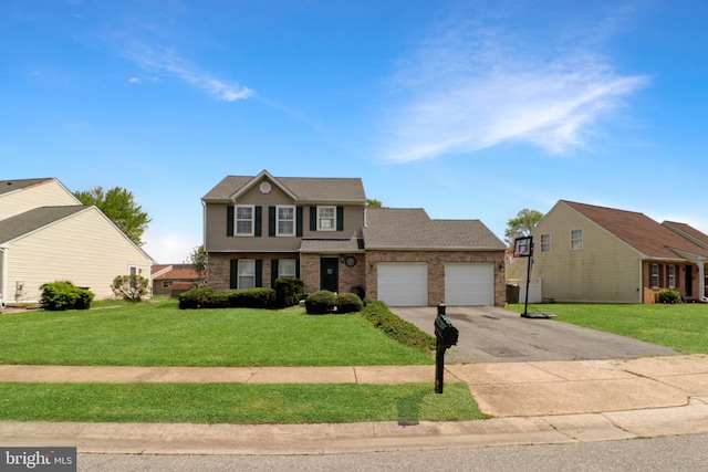 view of front of home featuring a front lawn and a garage