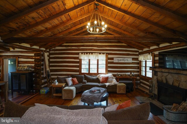 living room featuring a stone fireplace, vaulted ceiling with beams, rustic walls, hardwood / wood-style flooring, and wooden ceiling