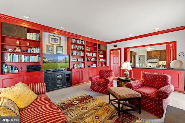 living room featuring built in features, ornamental molding, and light colored carpet