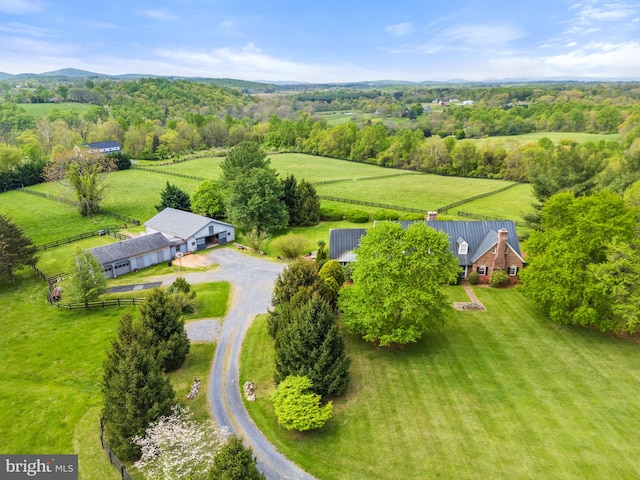 birds eye view of property featuring a rural view