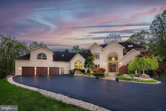 view of front of property featuring a garage