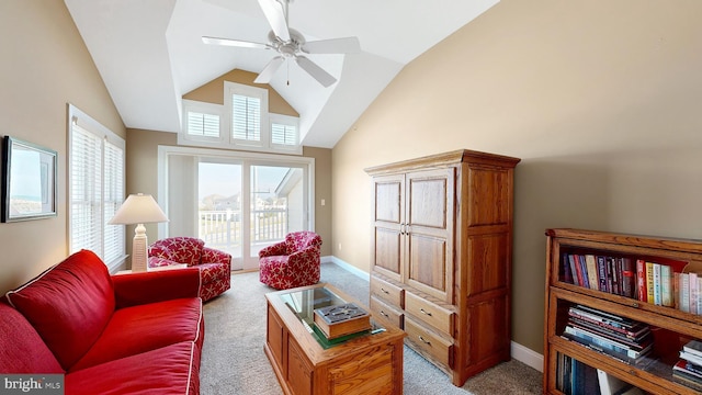 living room featuring light carpet, high vaulted ceiling, and ceiling fan