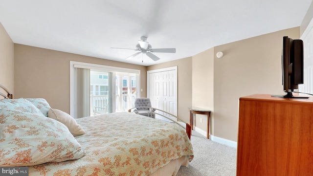 bedroom featuring ceiling fan, carpet floors, and a closet