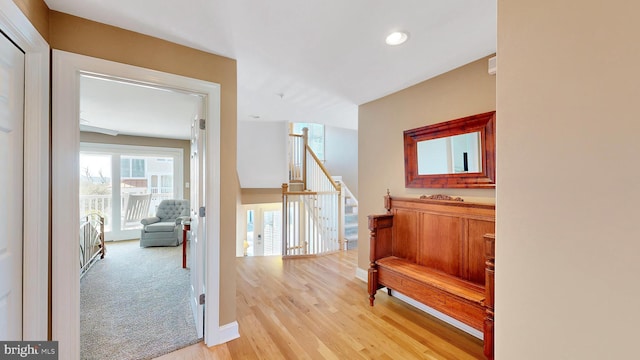 hallway with light wood-type flooring