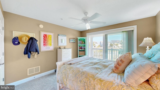 carpeted bedroom with ceiling fan and access to exterior