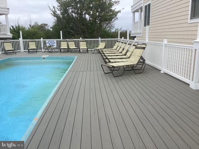 view of pool with a deck