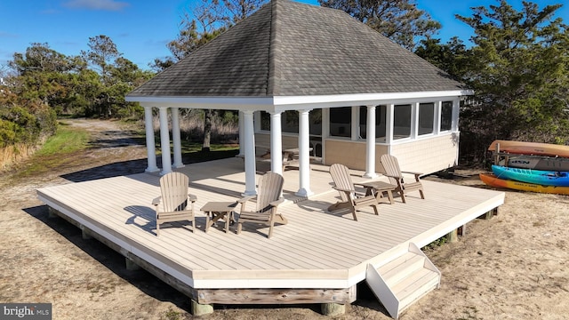 wooden deck featuring a gazebo