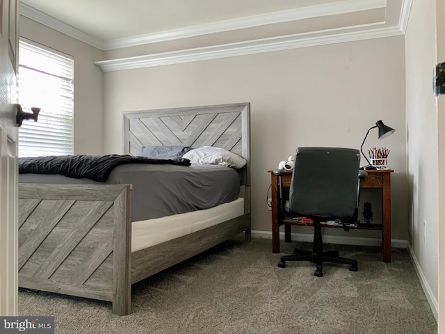 carpeted bedroom featuring crown molding