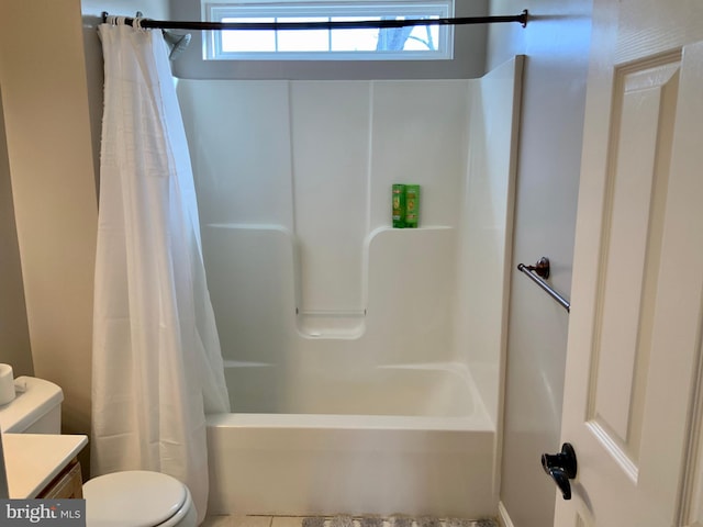 full bathroom featuring toilet, vanity, and shower / bath combo