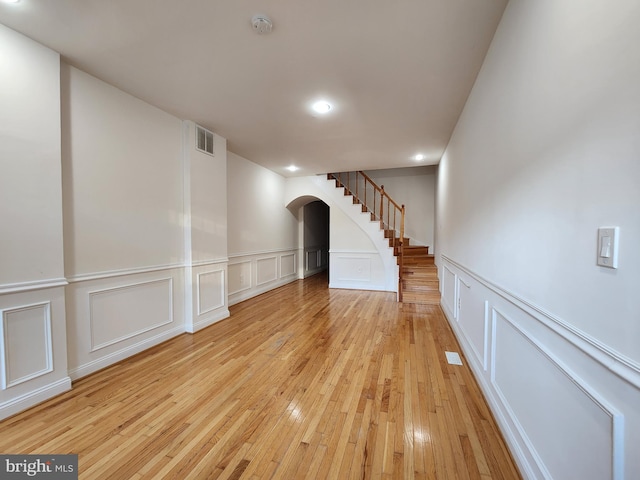 unfurnished room featuring light hardwood / wood-style flooring