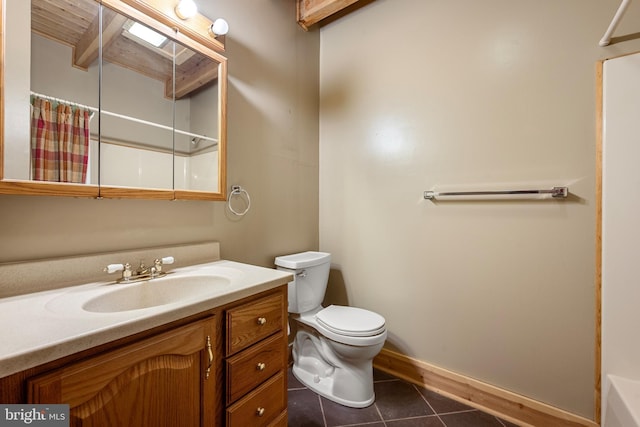 bathroom featuring curtained shower, beamed ceiling, tile patterned floors, toilet, and vanity