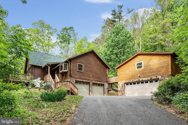 cabin featuring a garage