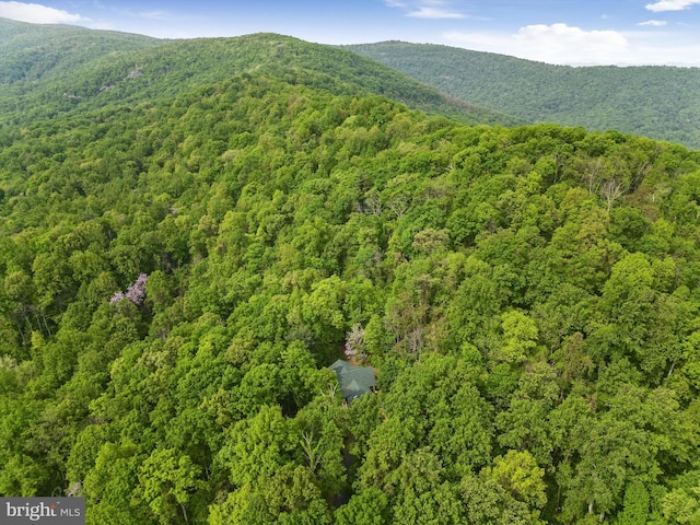 drone / aerial view featuring a mountain view