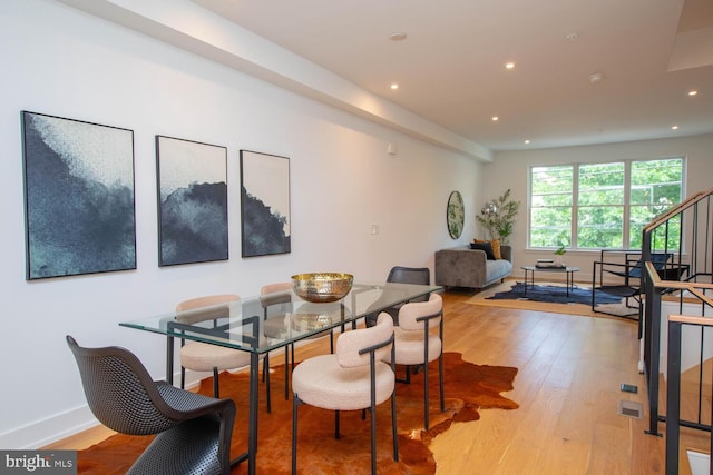 dining room with light hardwood / wood-style floors