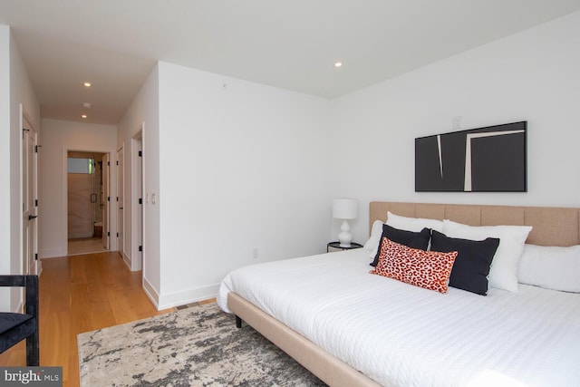 bedroom featuring light hardwood / wood-style flooring