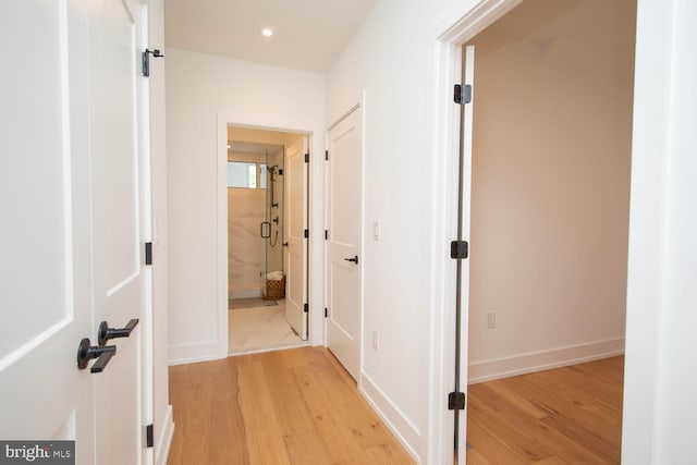 corridor featuring light wood-type flooring