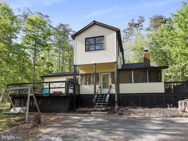 view of front of home with a wooden deck