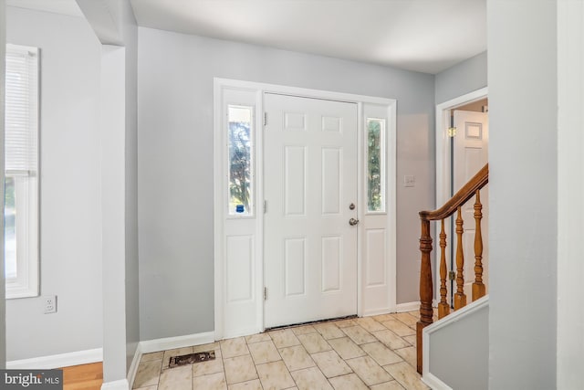 foyer entrance featuring plenty of natural light