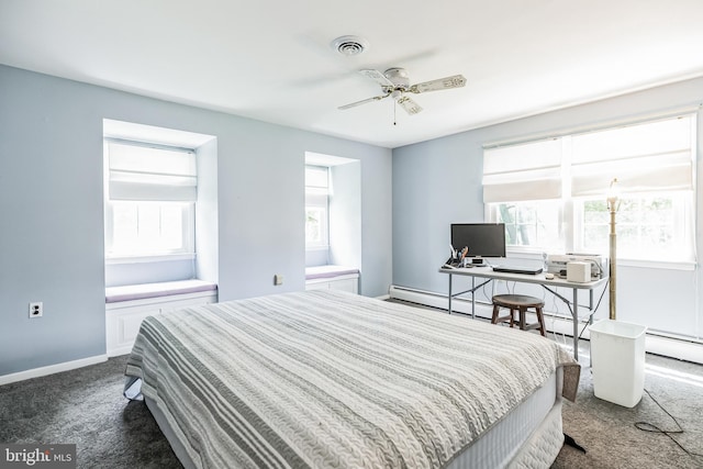 carpeted bedroom featuring ceiling fan and baseboard heating