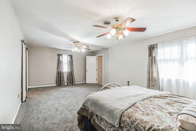 carpeted bedroom with a baseboard heating unit, ceiling fan, and multiple windows