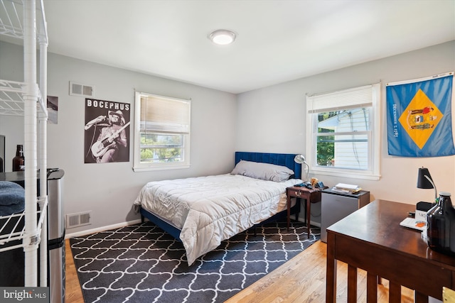 bedroom featuring hardwood / wood-style floors