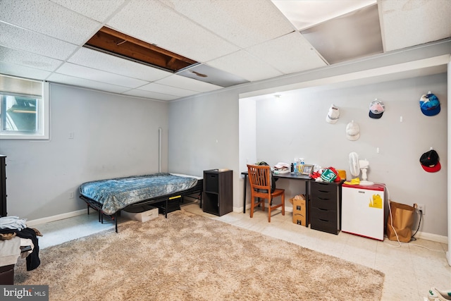 bedroom with a paneled ceiling