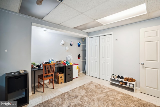 office space featuring a paneled ceiling