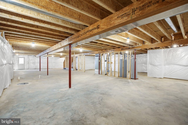 basement featuring heating unit