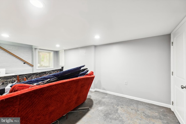 living room featuring concrete flooring