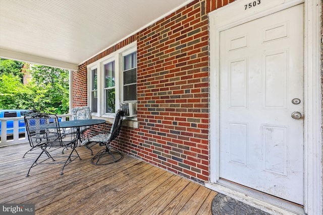 deck with cooling unit and a porch