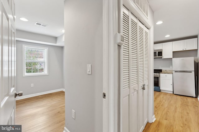 interior space with light hardwood / wood-style floors