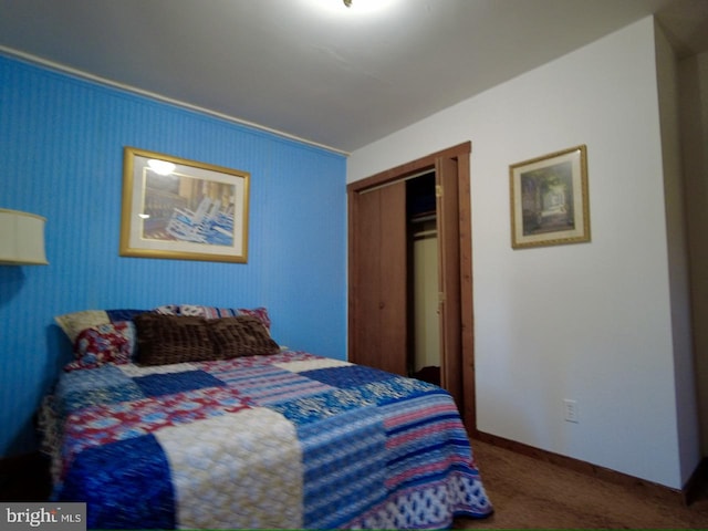 carpeted bedroom with a closet