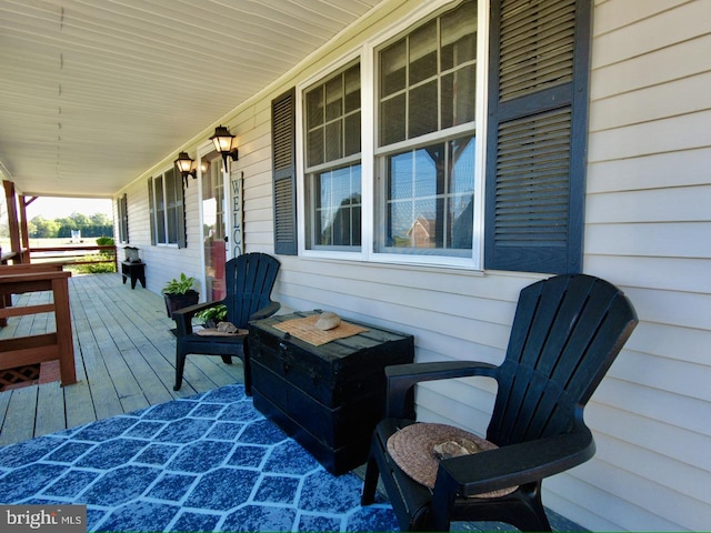 wooden deck featuring a porch