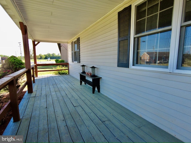 deck featuring covered porch