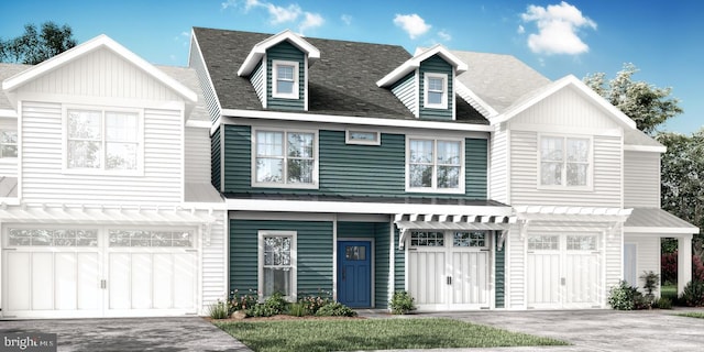 view of front of home with a garage