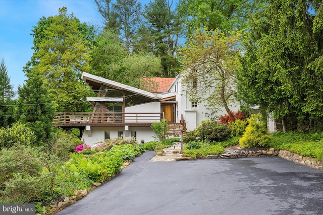 view of front of house featuring a deck