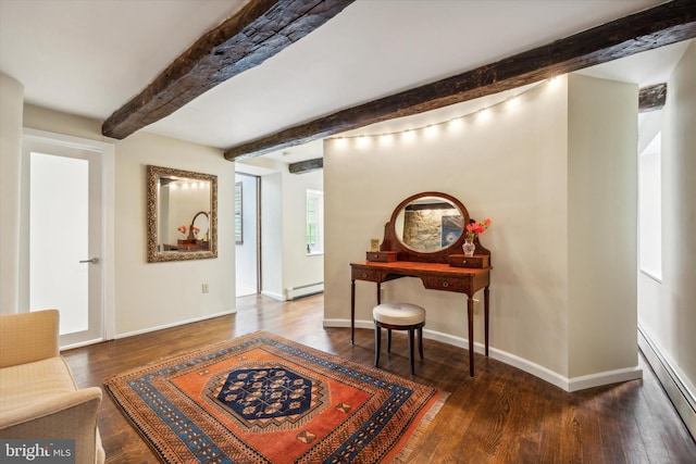 interior space featuring beam ceiling, a baseboard heating unit, and wood-type flooring