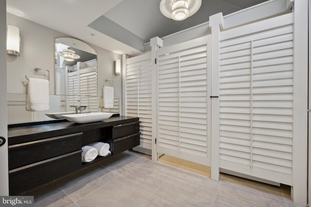 bathroom with vanity and tile patterned floors