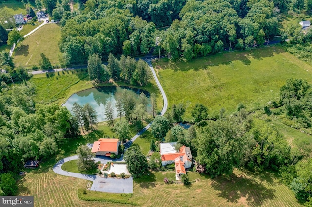 drone / aerial view featuring a rural view and a water view