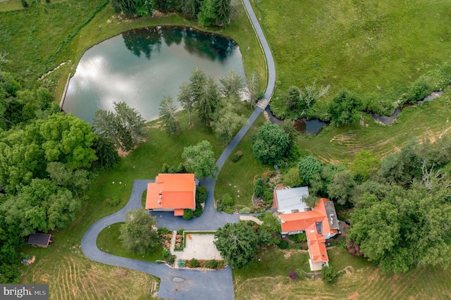 birds eye view of property featuring a water view